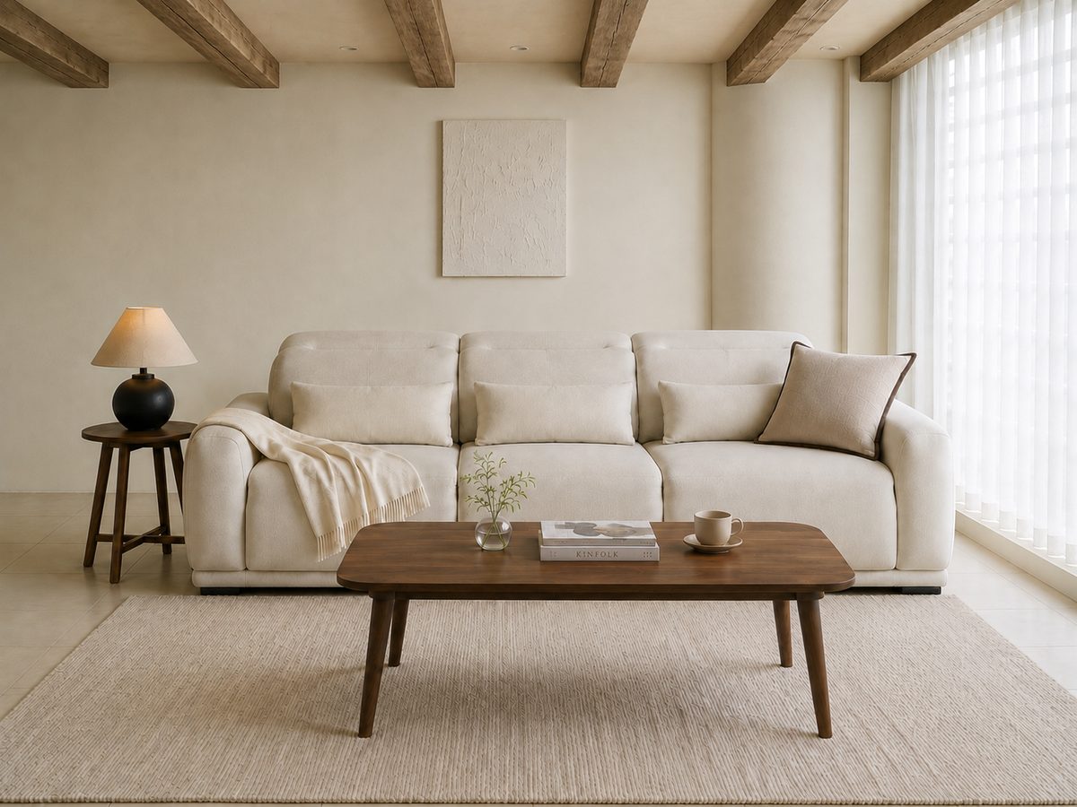 The same living room with exposed wooden beams and recessed downlights added to the ceiling; the furniture is unchanged but more of the ceiling is visible than in the original