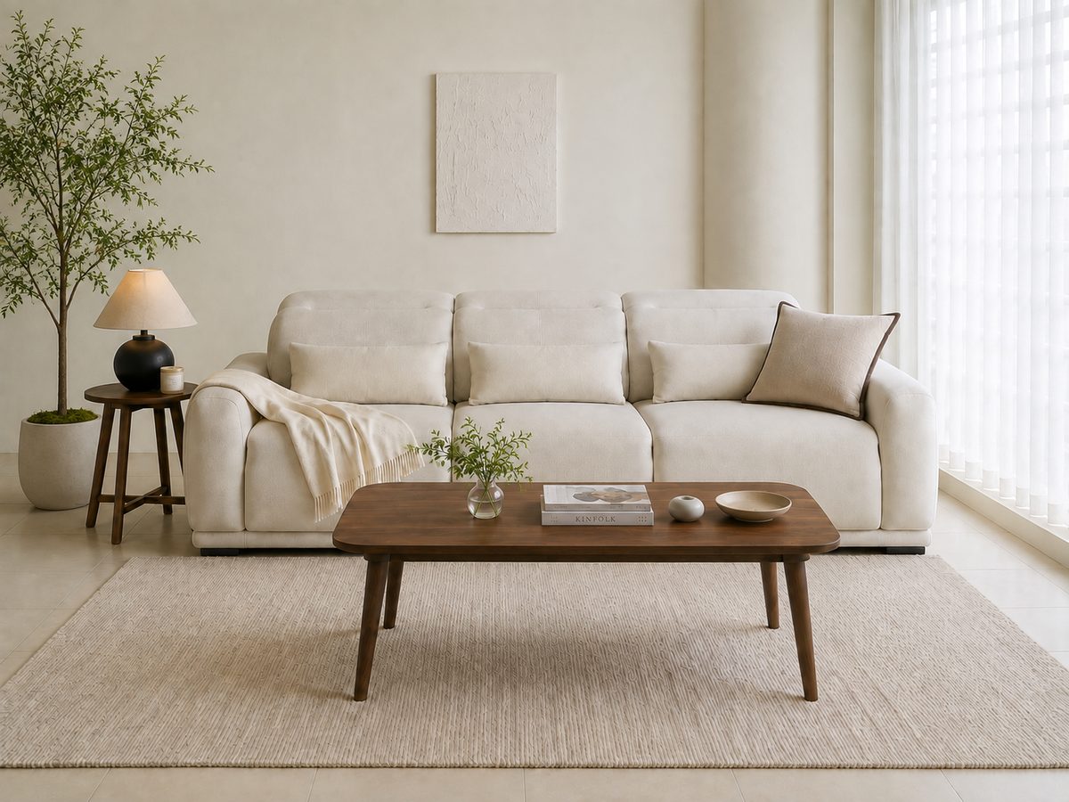 The same living room with plants and small decorative objects added; everything else is unchanged
