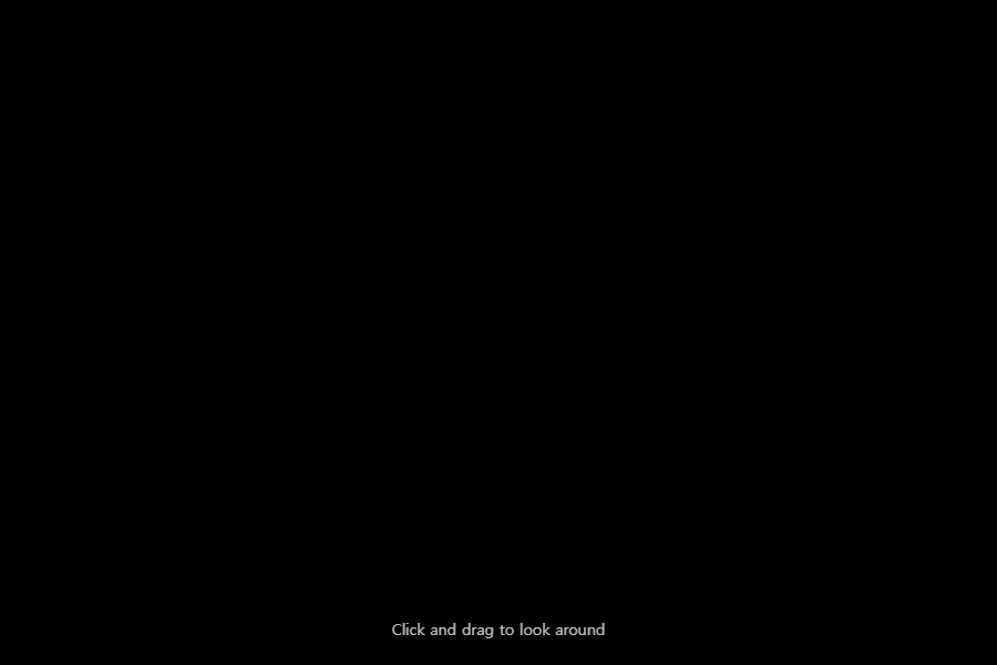 A black screen with only the caption 'Click and drag to look around' at the bottom